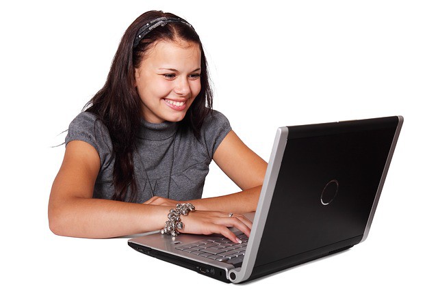 Photo by PublicDomainPictures laptop and woman photo